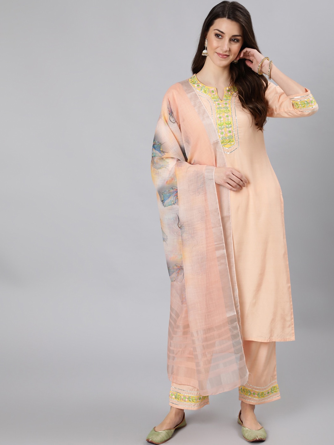 

Jaipur Kurti Women Peach-Coloured Floral Yoke Design Thread Work Kurta with Trousers & With Dupatta