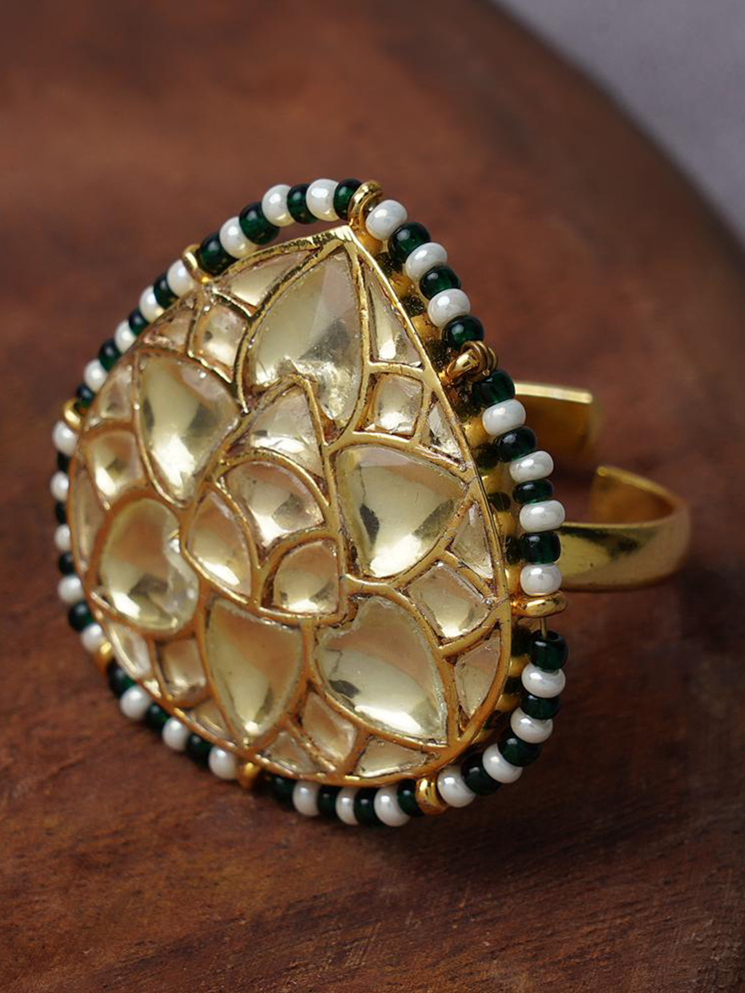 

AURAA TRENDS Gold-Plated Green & White Stone Studded Finger Ring