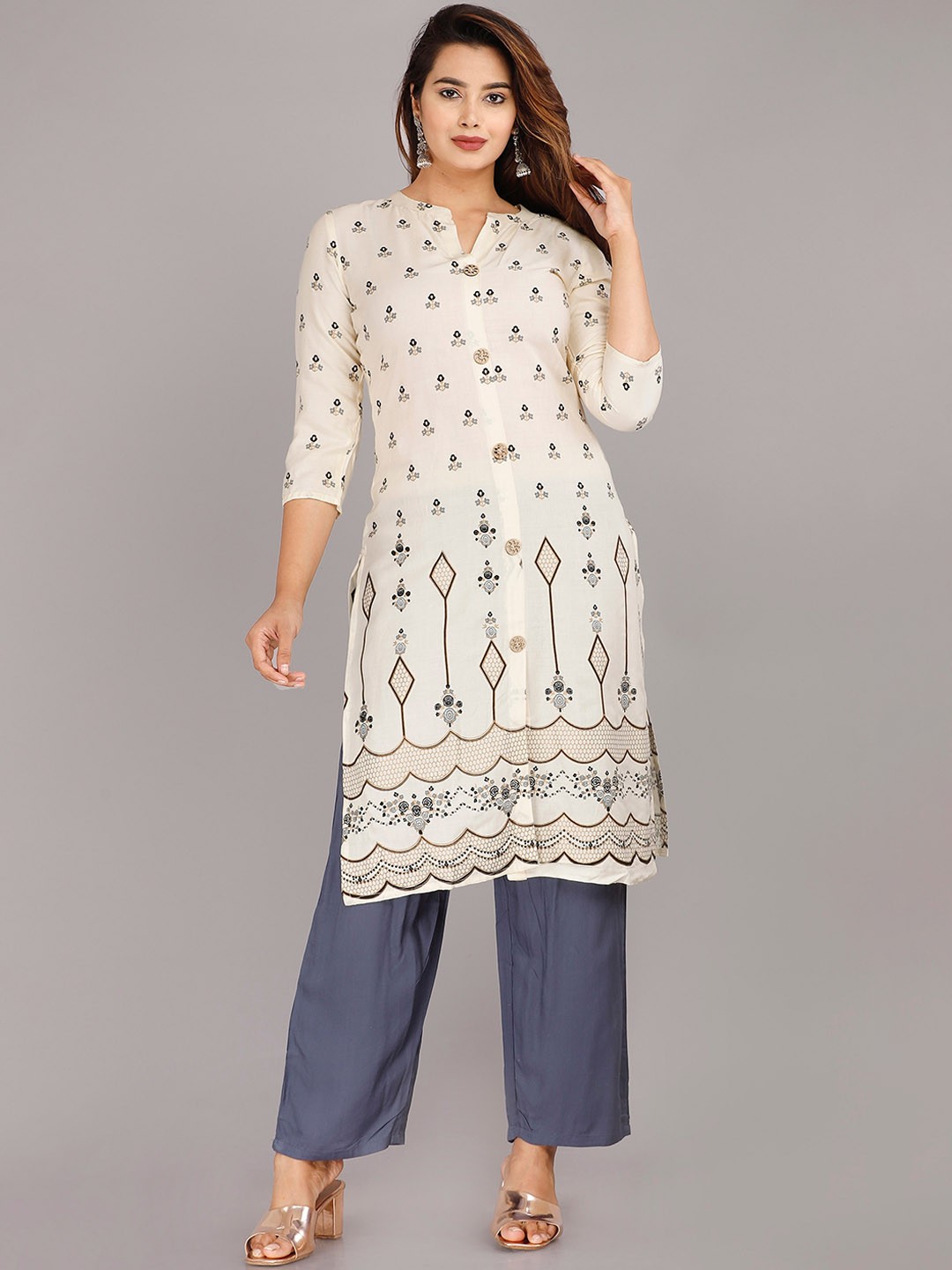 

SP DESIGNS Women Off White Floral Embroidered Kurti with Trousers