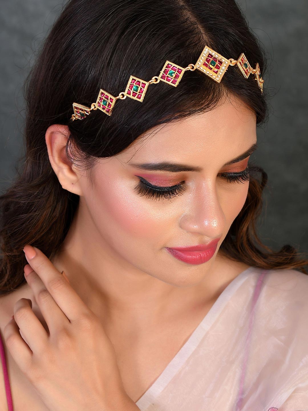 

Silvermerc Designs Gold Plated Red & White Stone Studded Mathapatti