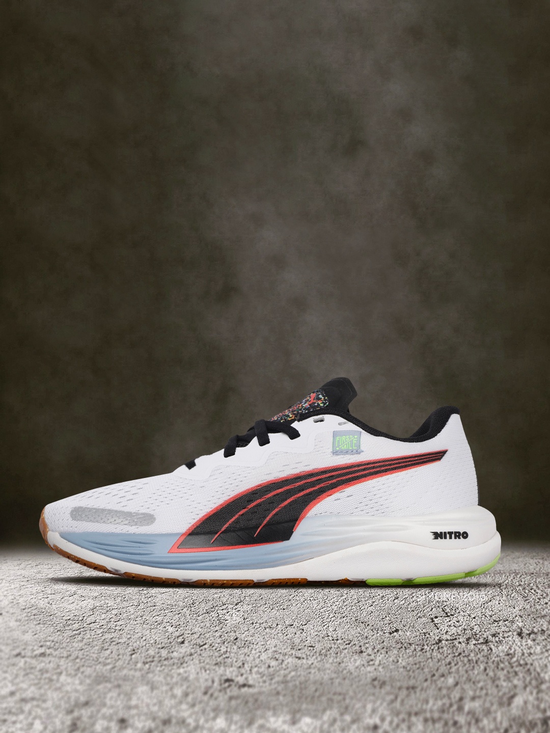 

Puma x First Mile Women White Solid Velocity Nitro 2 Running Shoes