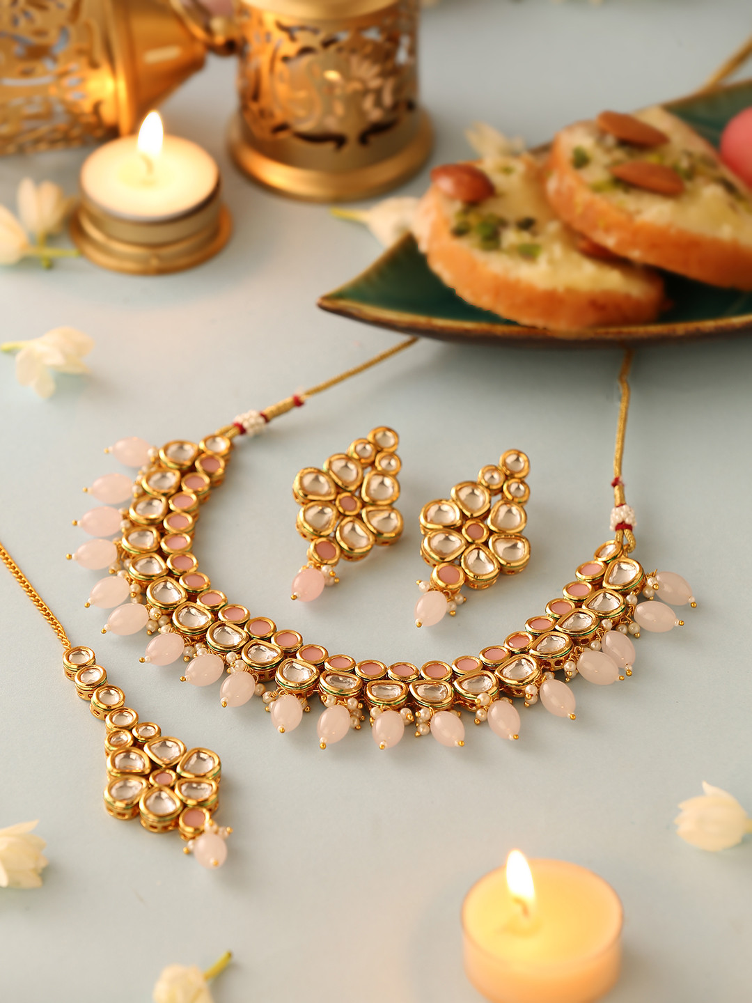 

Voylla Women Gold-Plated White Kundan Studded Jewelry Set