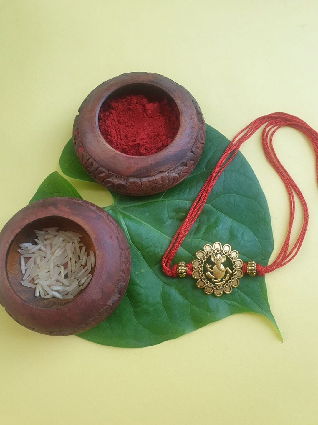 

FIROZA Gold-Toned Red Diety Rakhi