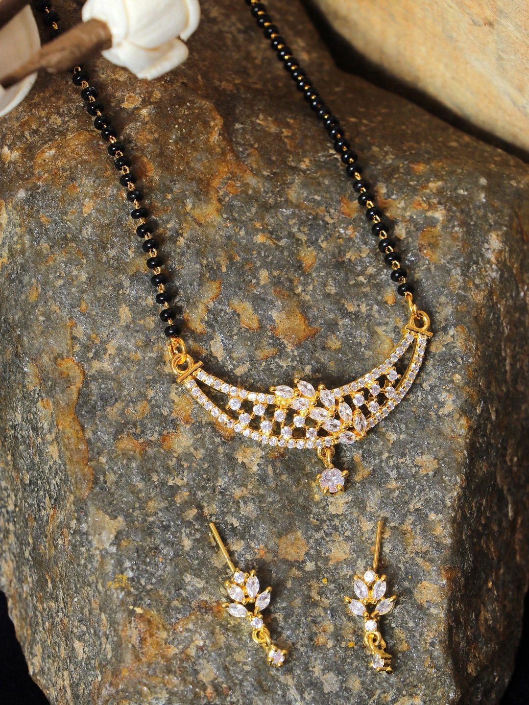 

SwaDev Gold-Plated Black Beaded & White AD Studded Multilayer Mangalsutra Set