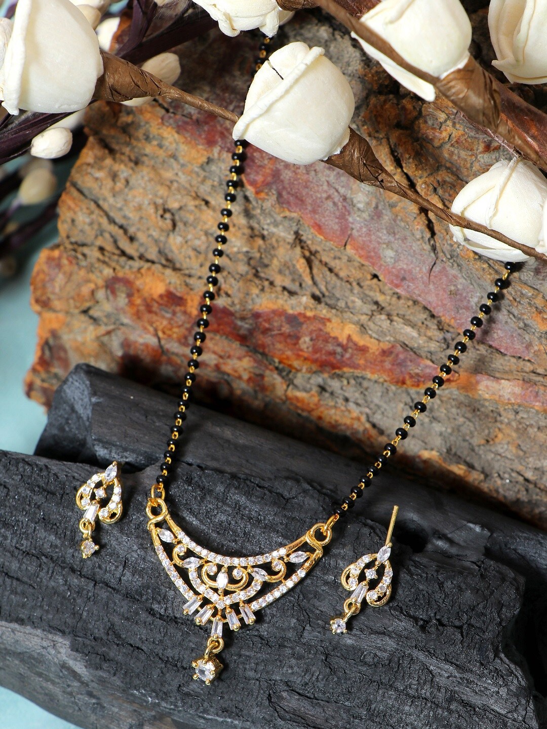 

SwaDev Gold-Plated Gold-Toned Crystal Studded & Beaded Mangalsutra With Earring