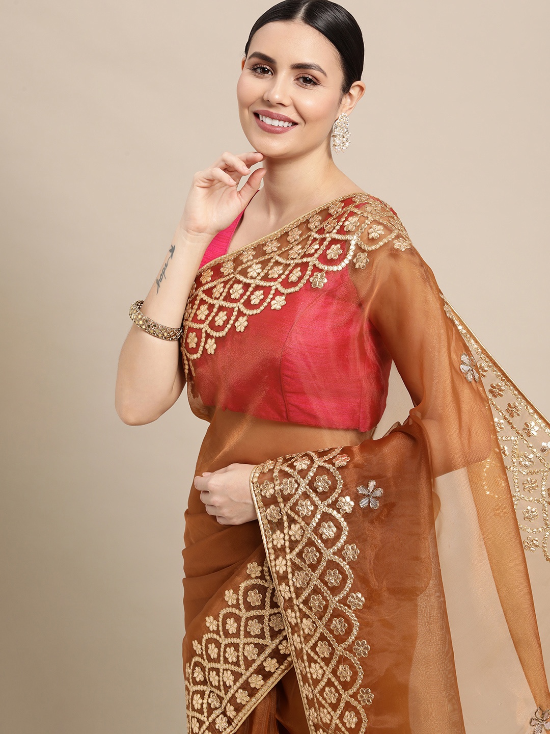 

VASTRANAND Brown Embroidered Organza Heavy Border Saree