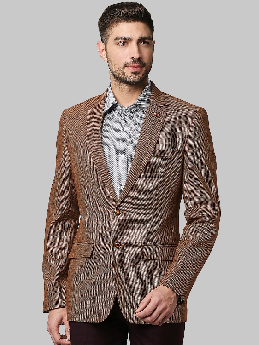 

Raymond Men Brown Solid Single Breasted Blazer