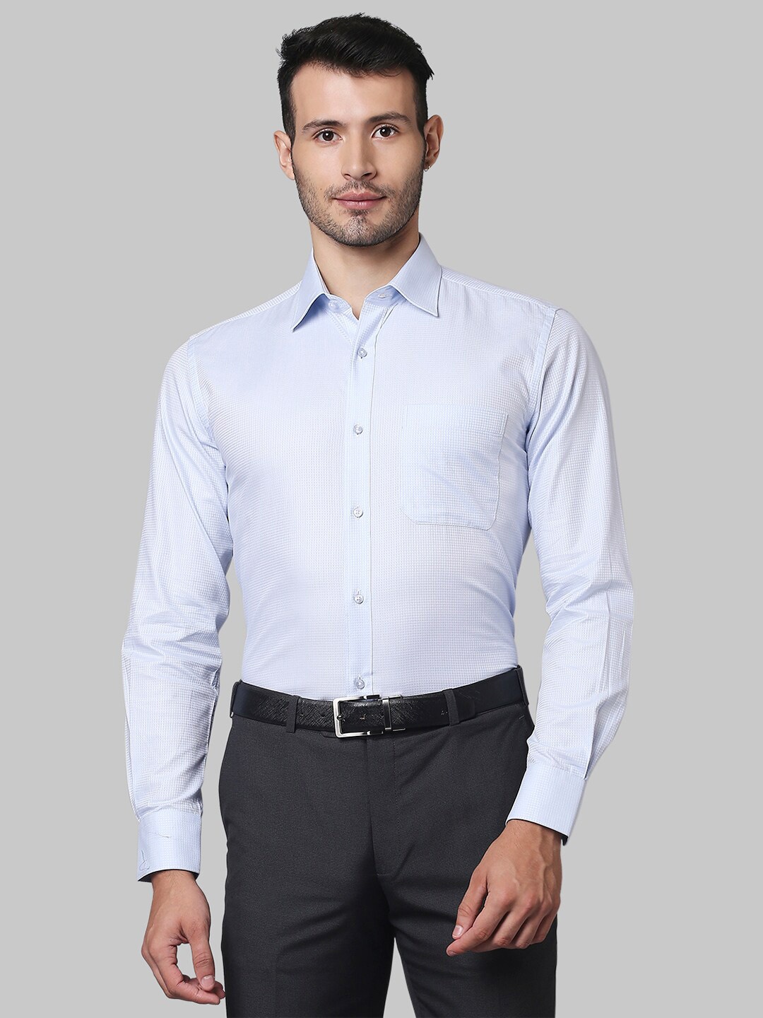 

Raymond Men Blue Solid Pure Cotton Formal Shirt