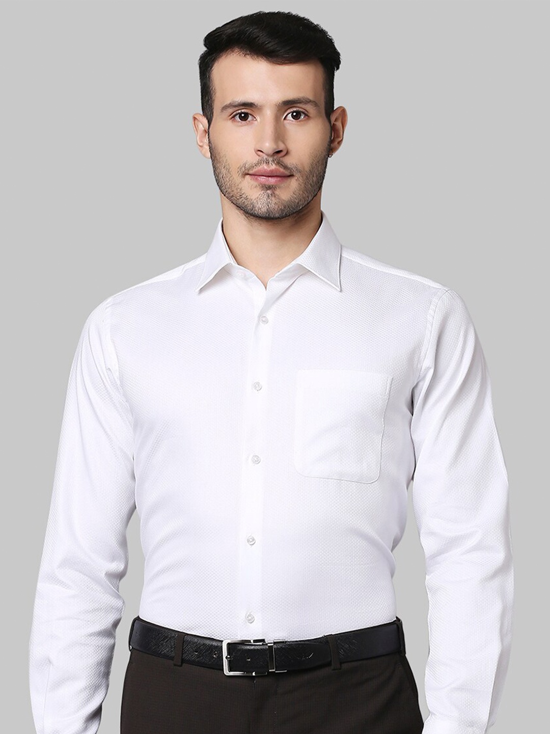 

Raymond Men White Solid Shirts