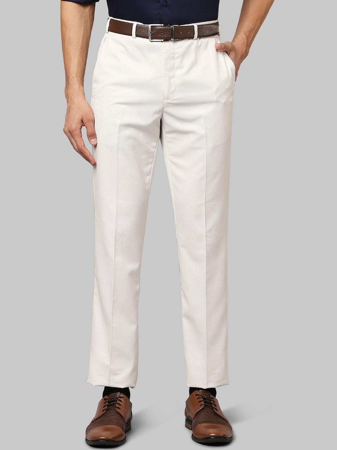 

Raymond Men Beige Solid Pleated Trousers
