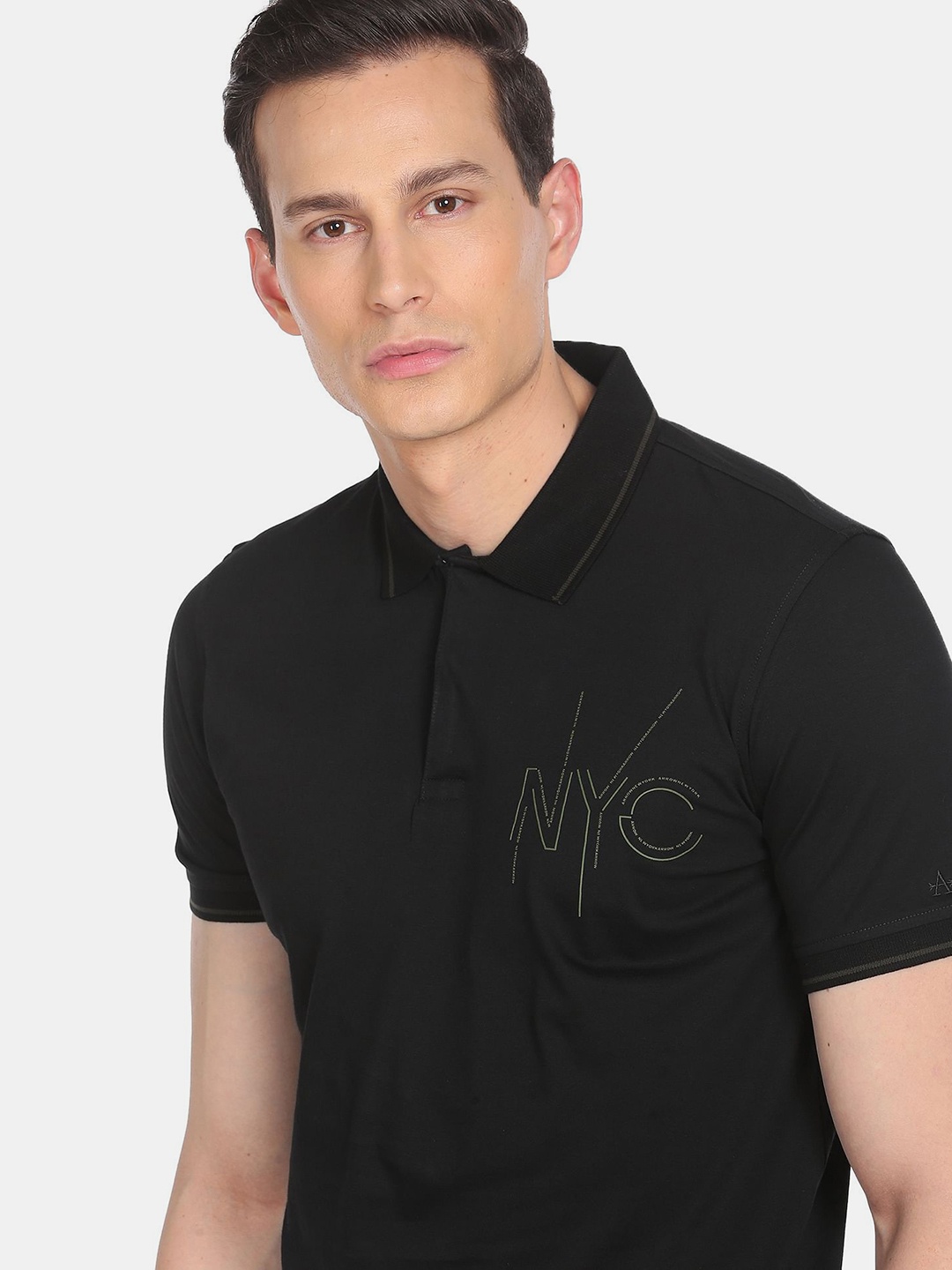 

Arrow New York Men Black Polo Collar Solid Cotton T-shirt