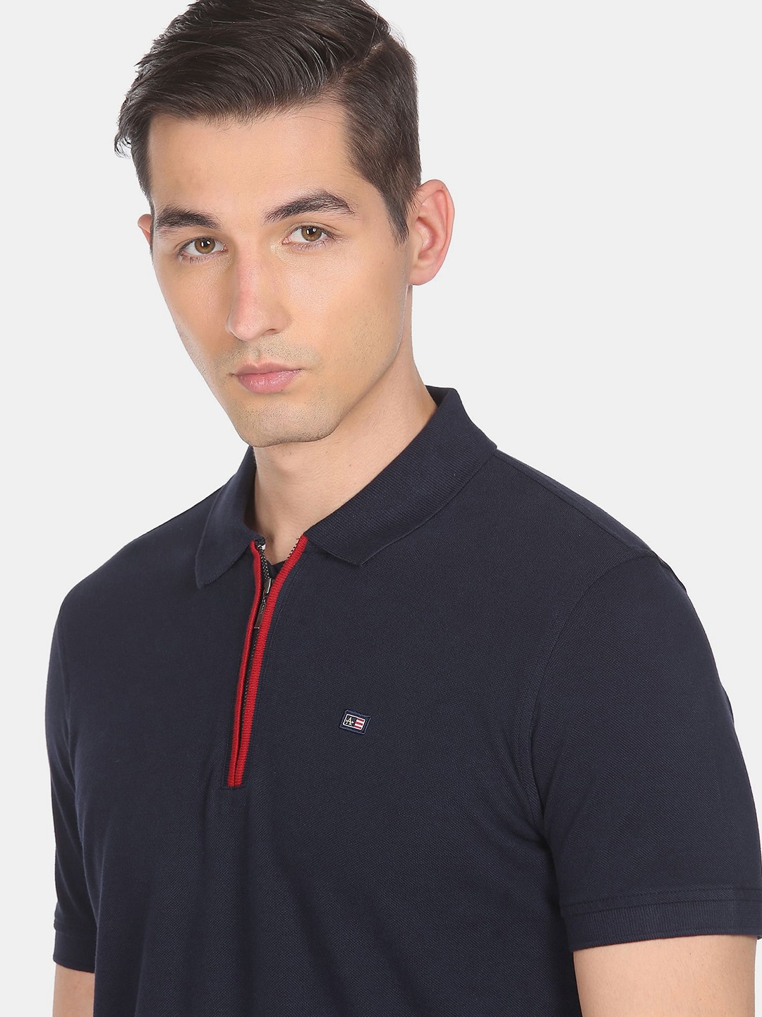 

Arrow Sport Men Navy Blue Polo Collar Applique T-shirt