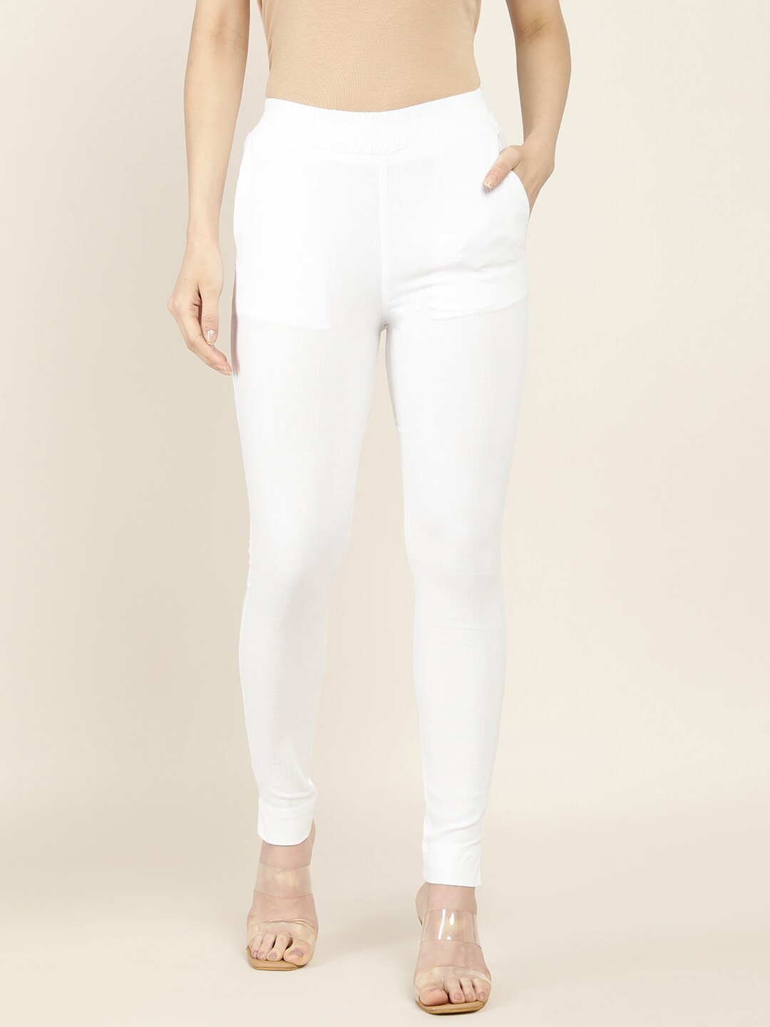 

Soch Women White Solid Cigarette Trousers