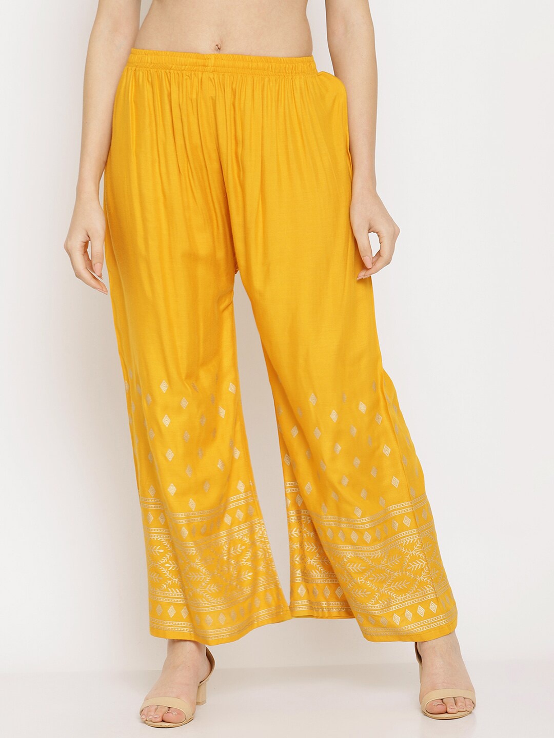 

Miaz Lifestyle Women Yellow & Gold-Toned Ethnic Motifs Printed Knitted Palazzos