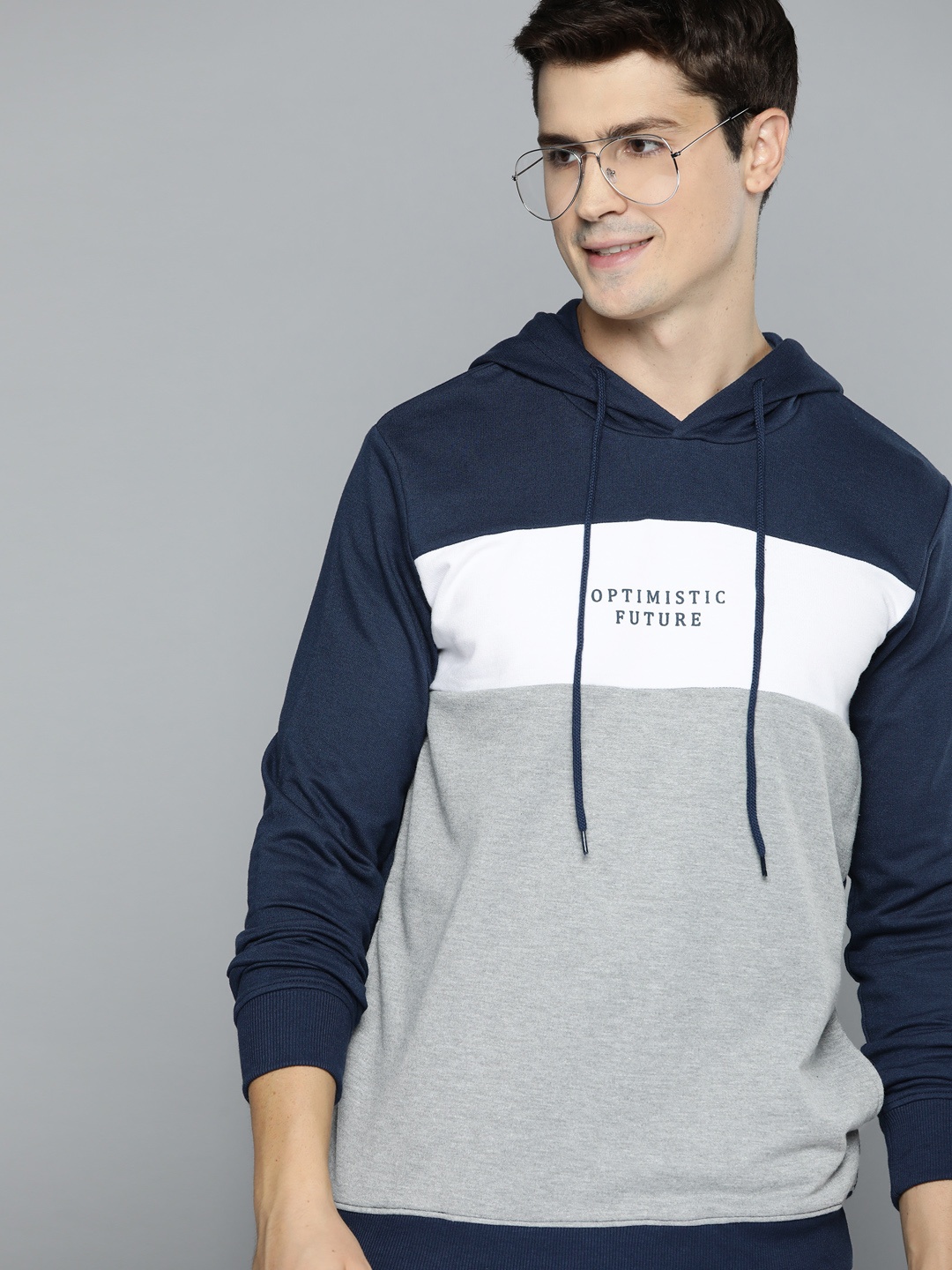 

Mast & Harbour Men Grey Melange & Navy Blue Colourblocked Hooded Sweatshirt