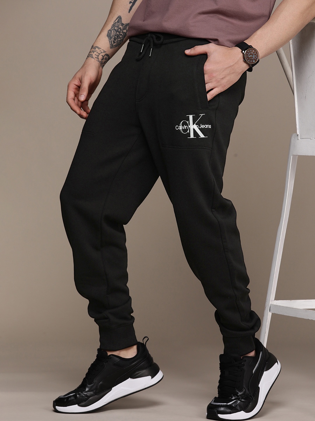 

Calvin Klein Jeans Black Embroidered Brand Logo Mid Rise Casual Joggers