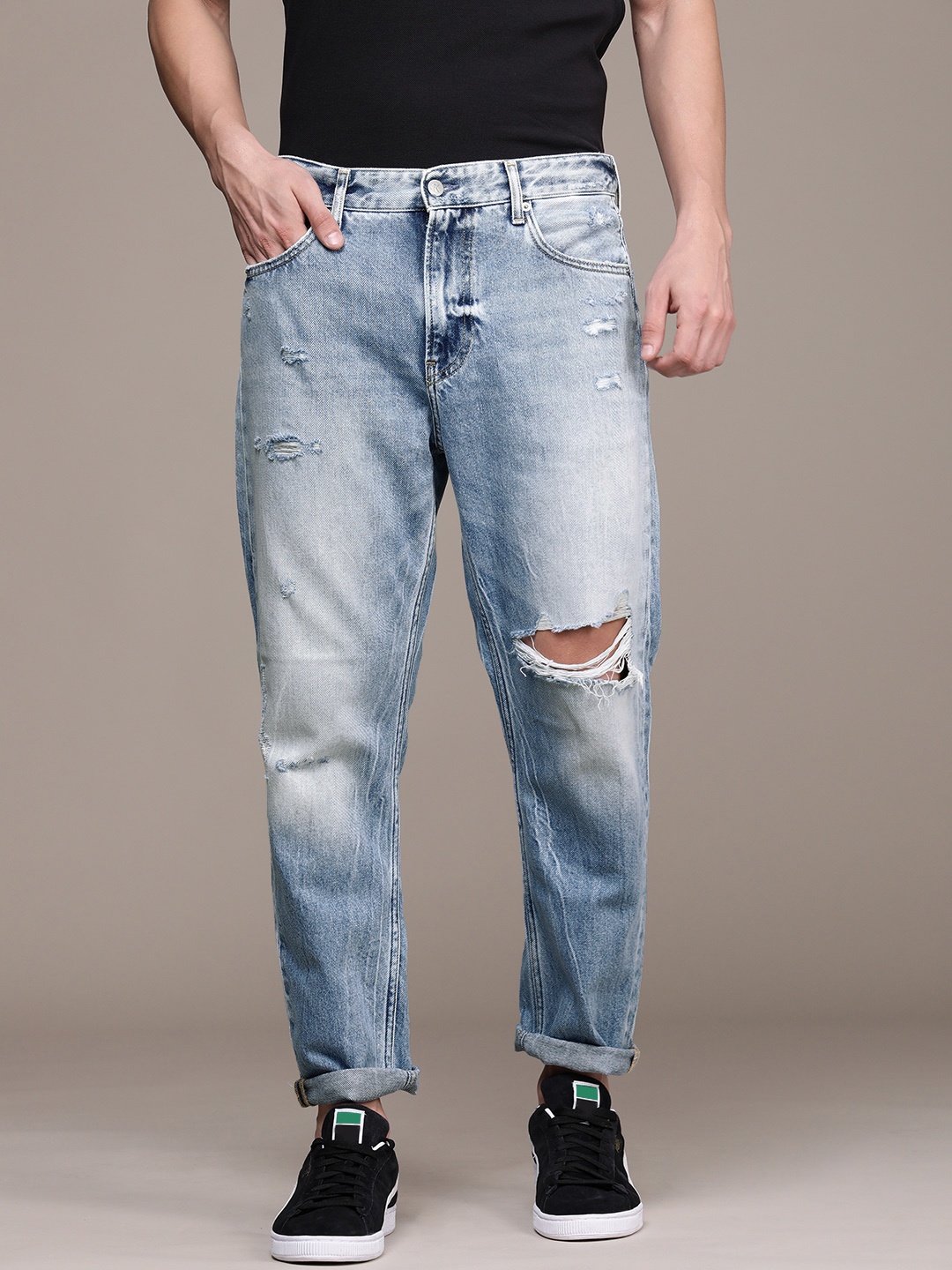 

Calvin Klein Jeans Men Blue Dad Fit Slashed Knee Light Fade Stretchable Jeans
