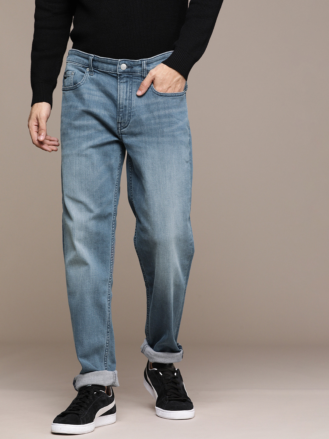 

Calvin Klein Jeans Men Blue Tapered Fit Light Fade Stretchable Jeans