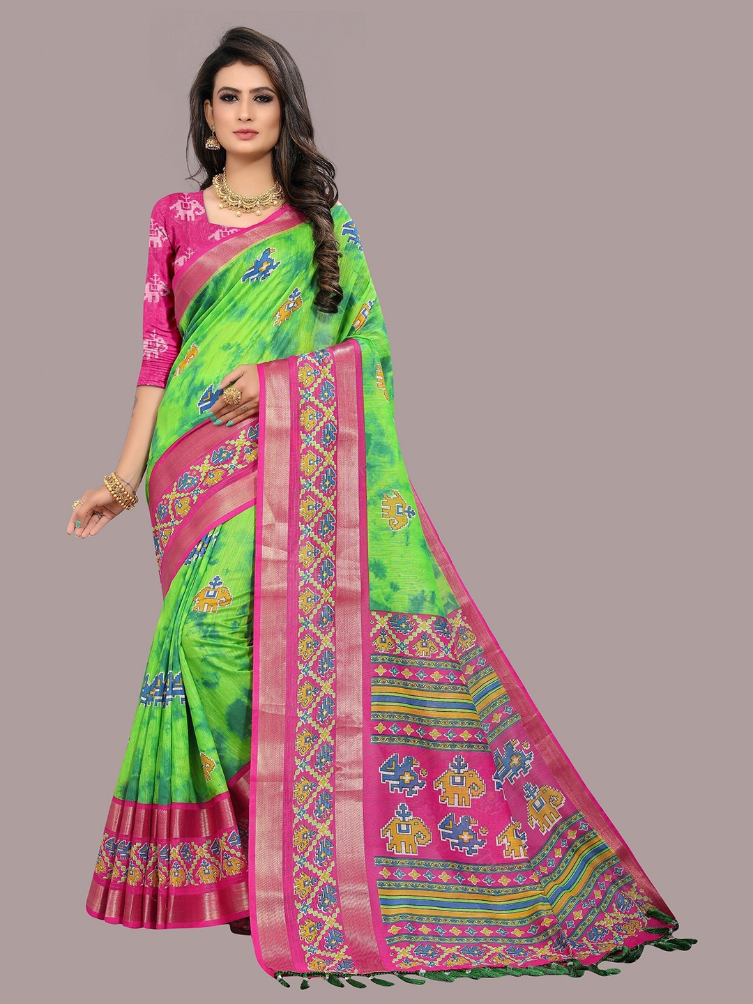 

Divine International Trading Co Green & Pink Zari Patola Saree