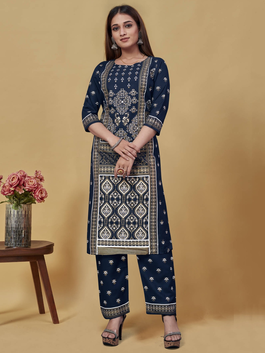 

nirja Fab Women Blue Ethnic Motifs Embroidered Kurti With Trouser