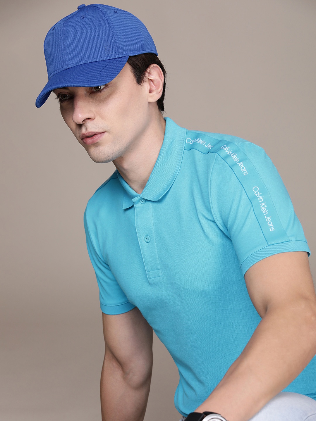 

Calvin Klein Jeans Men Turquoise Blue Taping Detail Polo Collar Slim Fit T-shirt