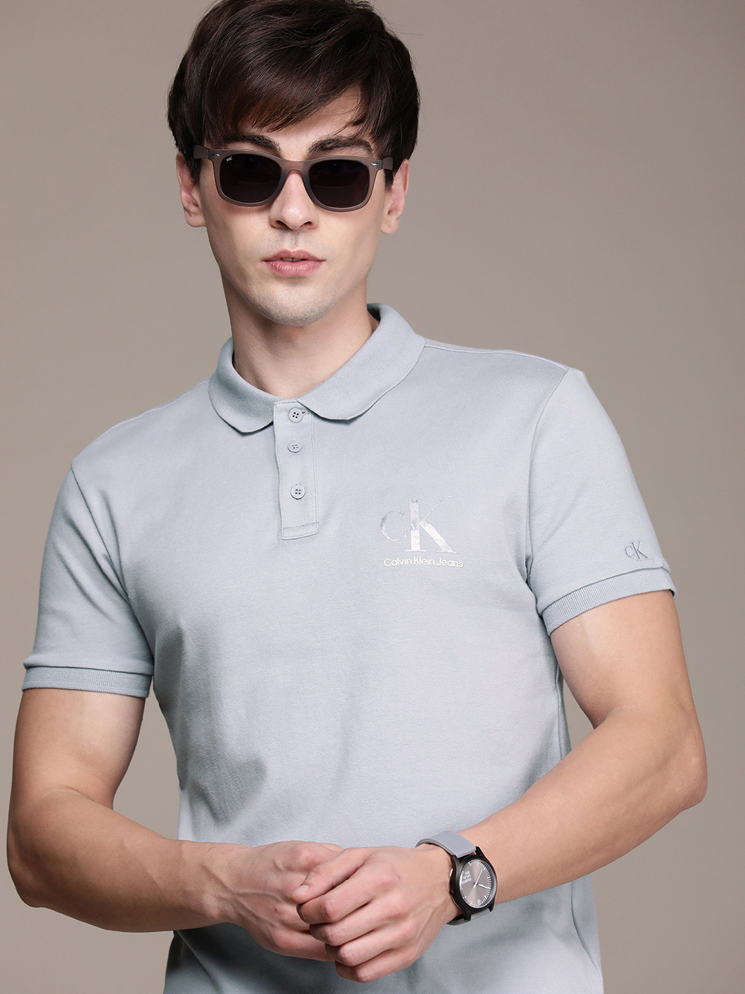 

Calvin Klein Jeans Men Blue & Grey Brand Logo Printed Polo Collar Pure Cotton T-shirt
