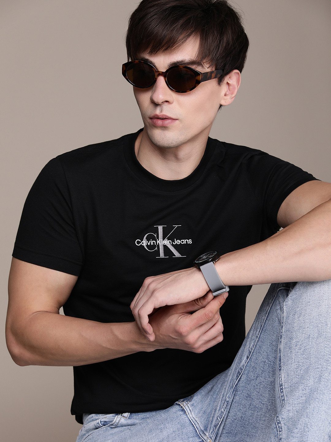 

Calvin Klein Jeans Men Black & White Brand Logo Embroidered Slim Fit T-shirt