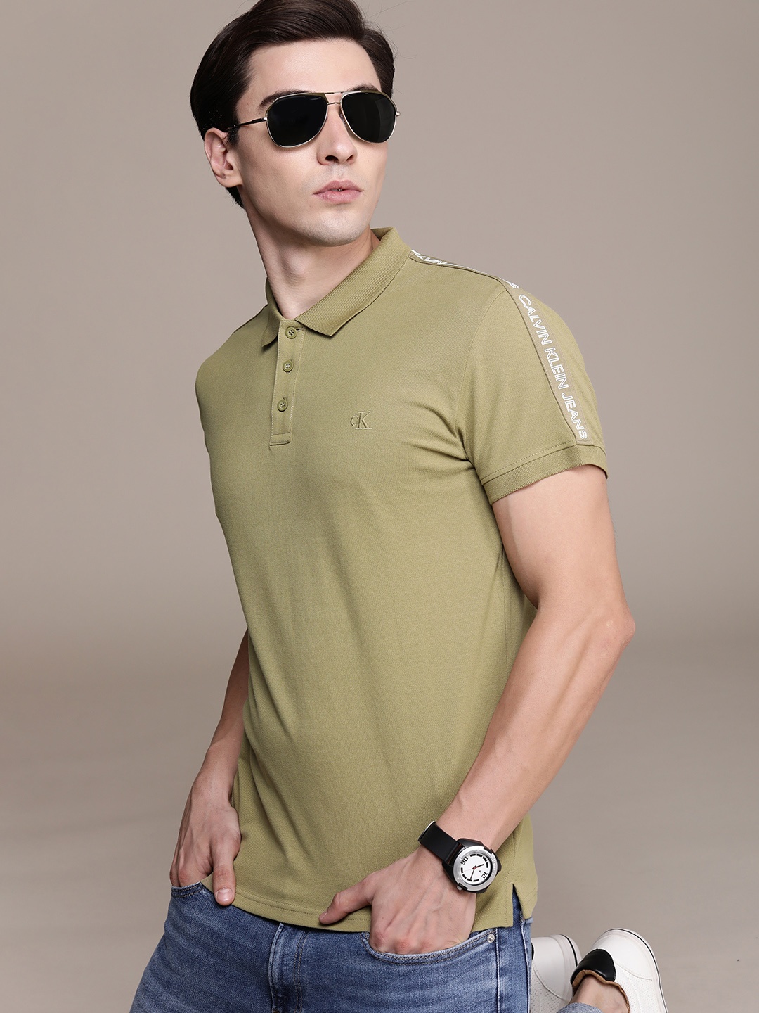 

Calvin Klein Jeans Men Olive Green & White Brand Logo Printed Polo Collar Slim Fit T-shirt