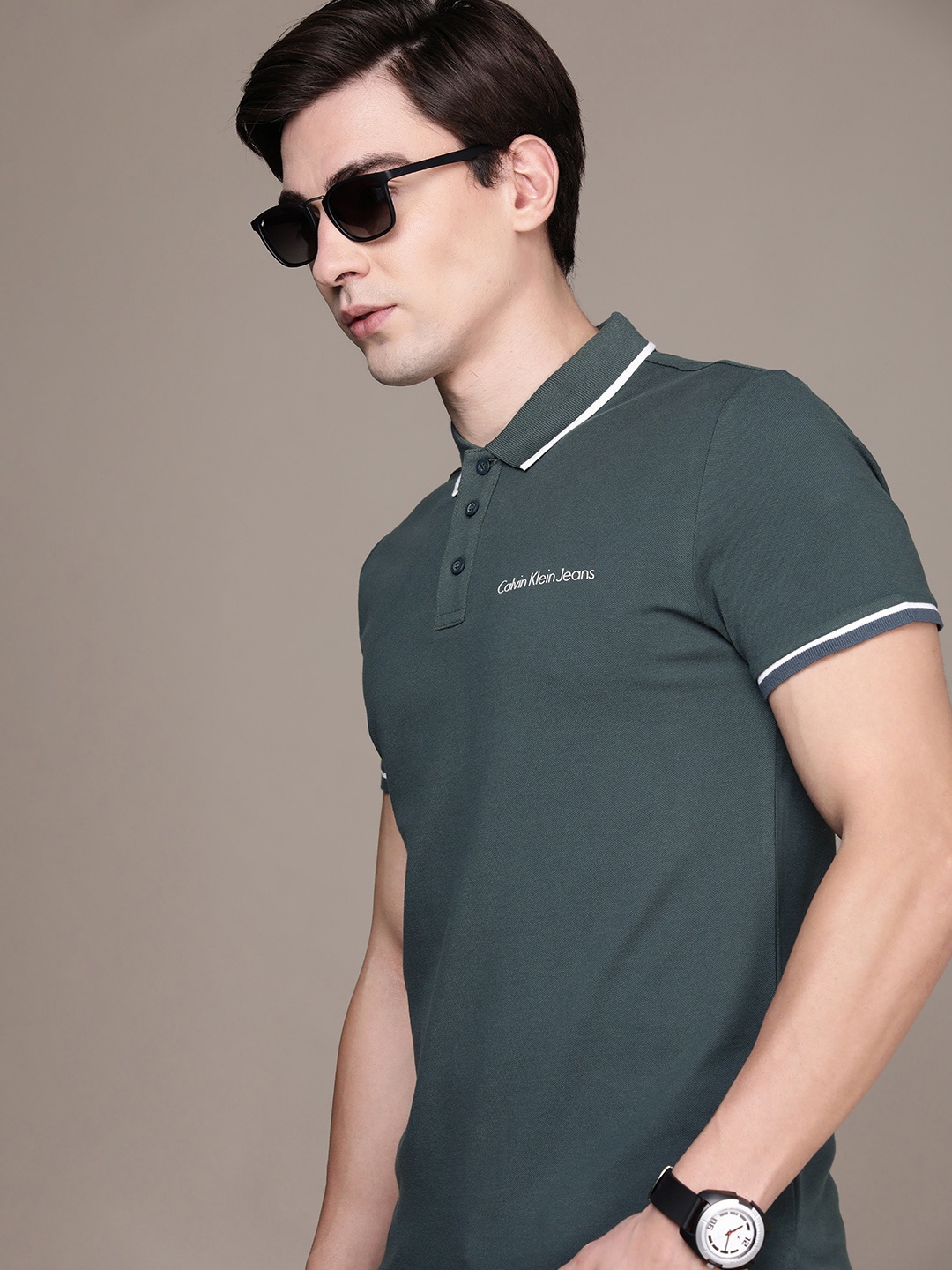

Calvin Klein Jeans Men Teal Blue Polo Collar Slim Fit T-shirt