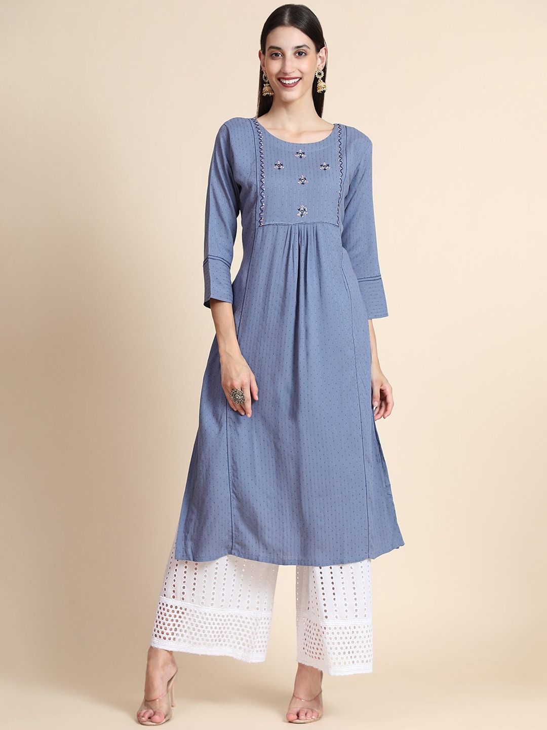 

Color Trends Women Sea Green Yoke Design Thread Work Kurta