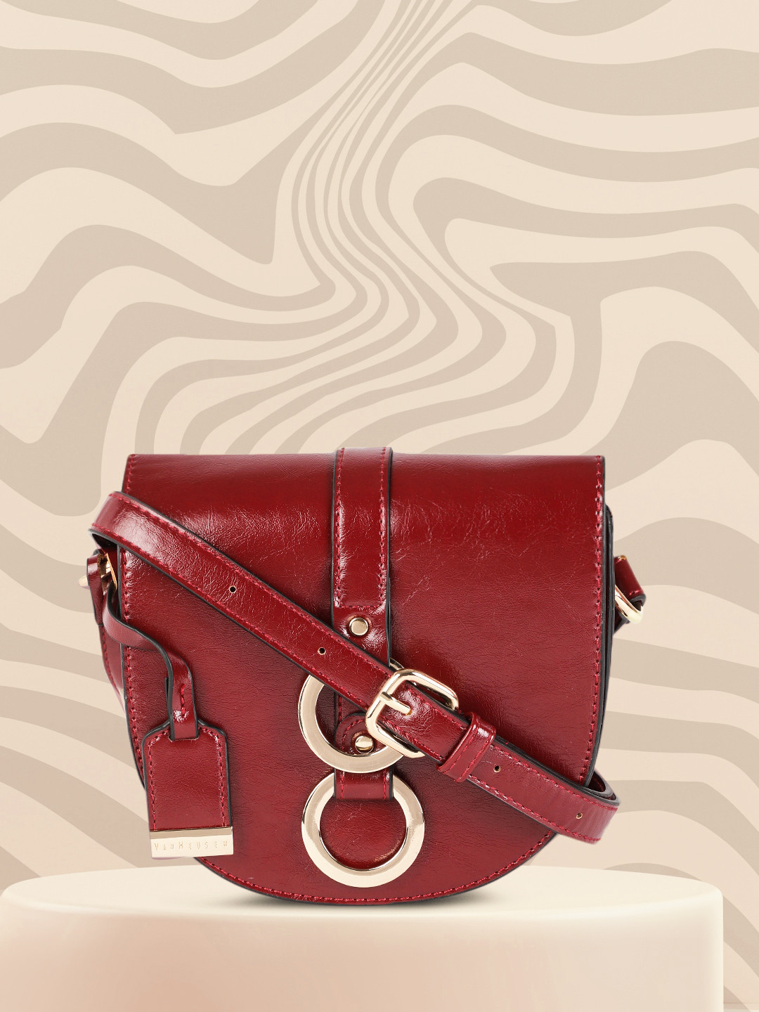 

Van Heusen Burgundy Solid Half Moon Sling Bag