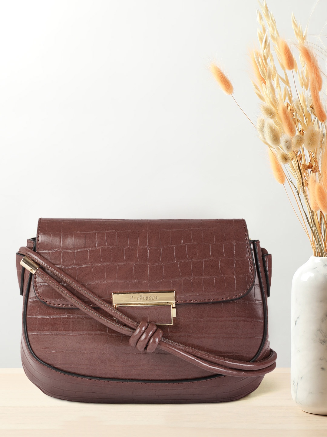 

Van Heusen Brown Animal Textured Structured Sling Bag
