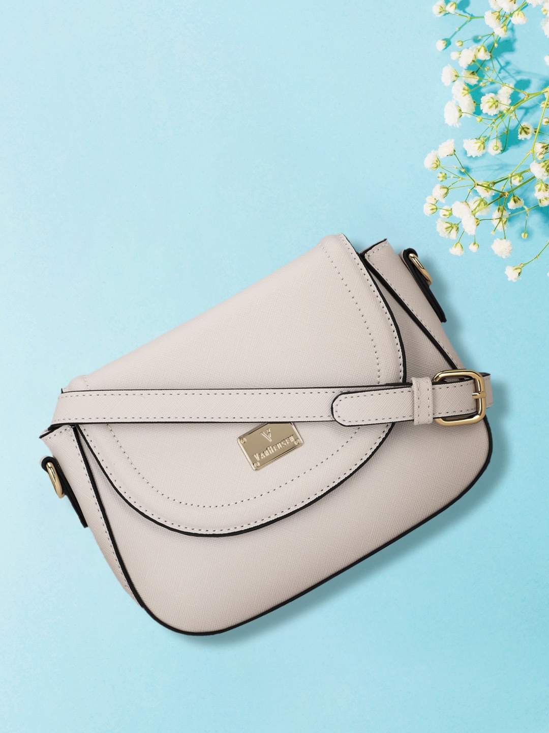 

Van Heusen Off White Solid Sling Bag