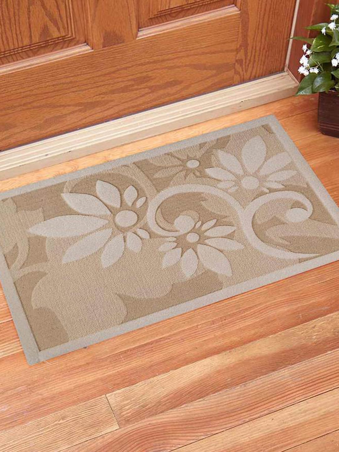 

Gallery99 Beige Self-Design Abstract Laser Cut Doormat