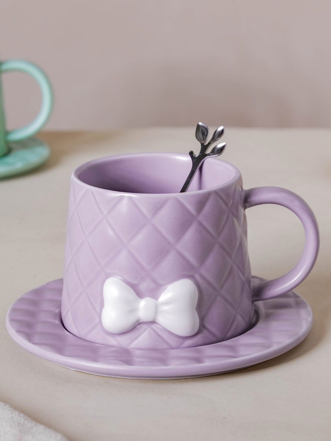 

Nestasia Purple Textured Ceramic Matte Bow Cup & Saucer With Spoon