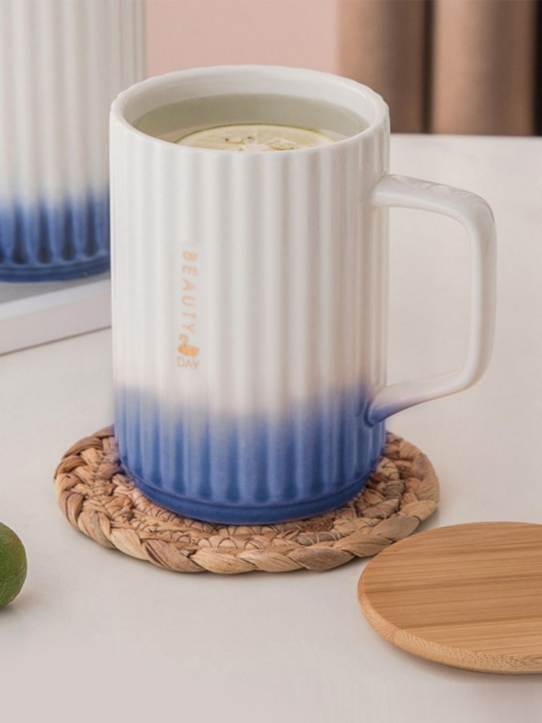 

Nestasia White & Blue Ceramic Mug with Lid and Spoon