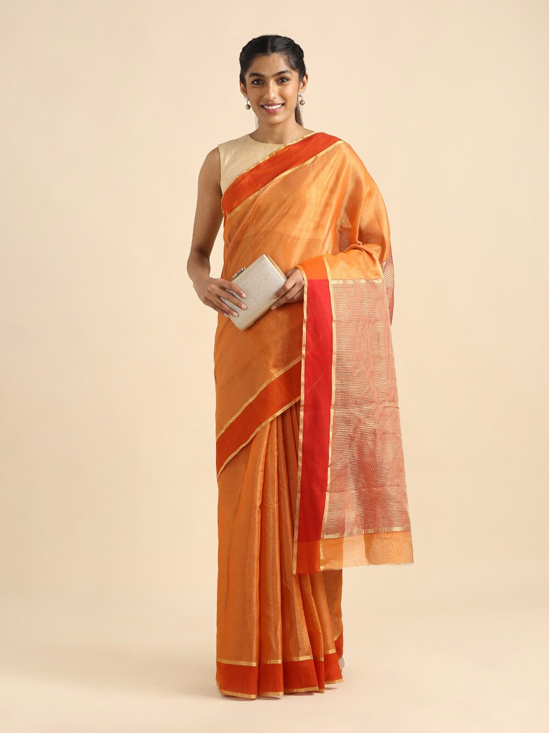 

Taneira Orange & Gold-Toned Zari Tissue Chanderi Saree