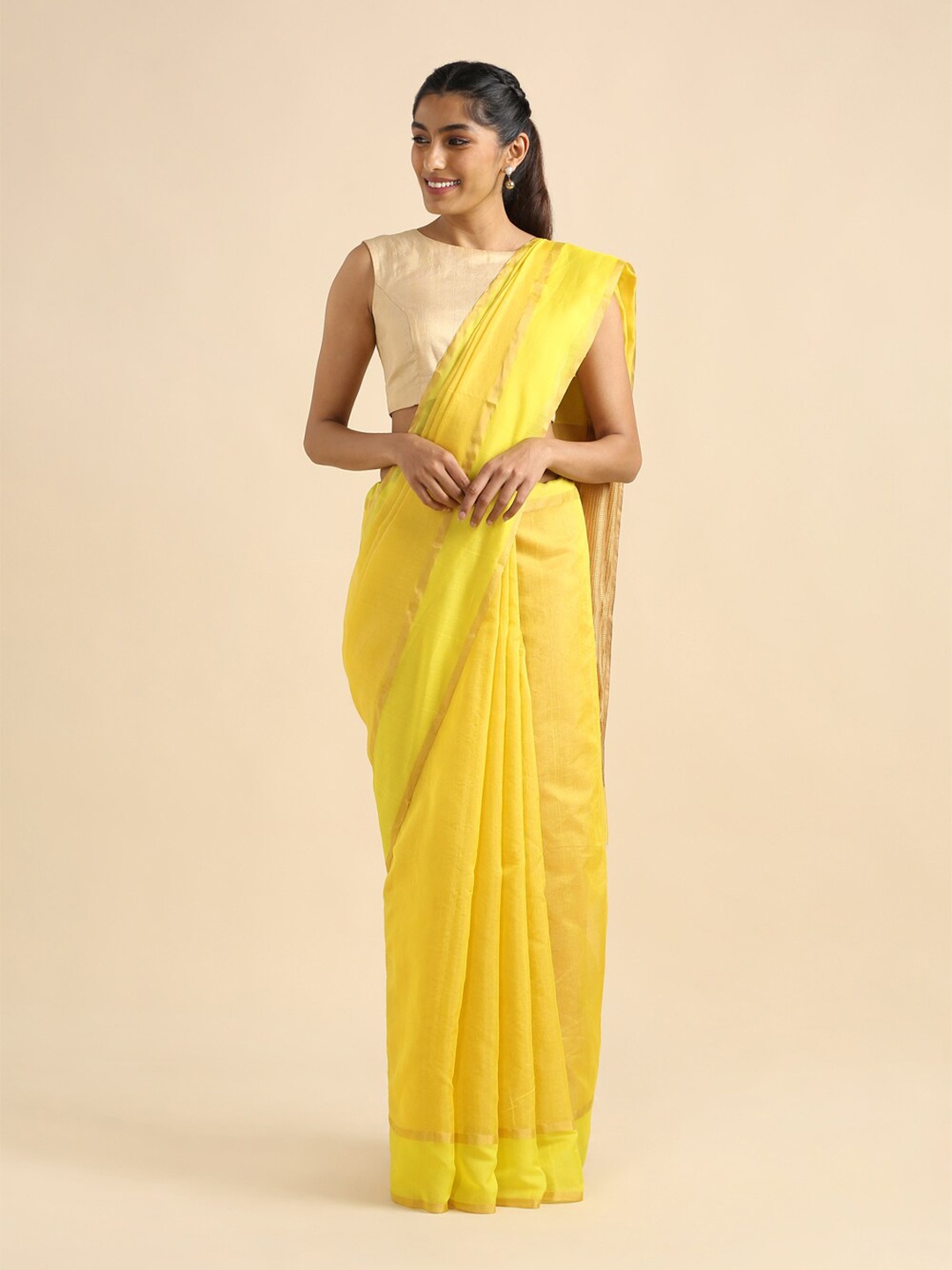 

Taneira Yellow & Gold-Toned Zari Tissue Chanderi Saree