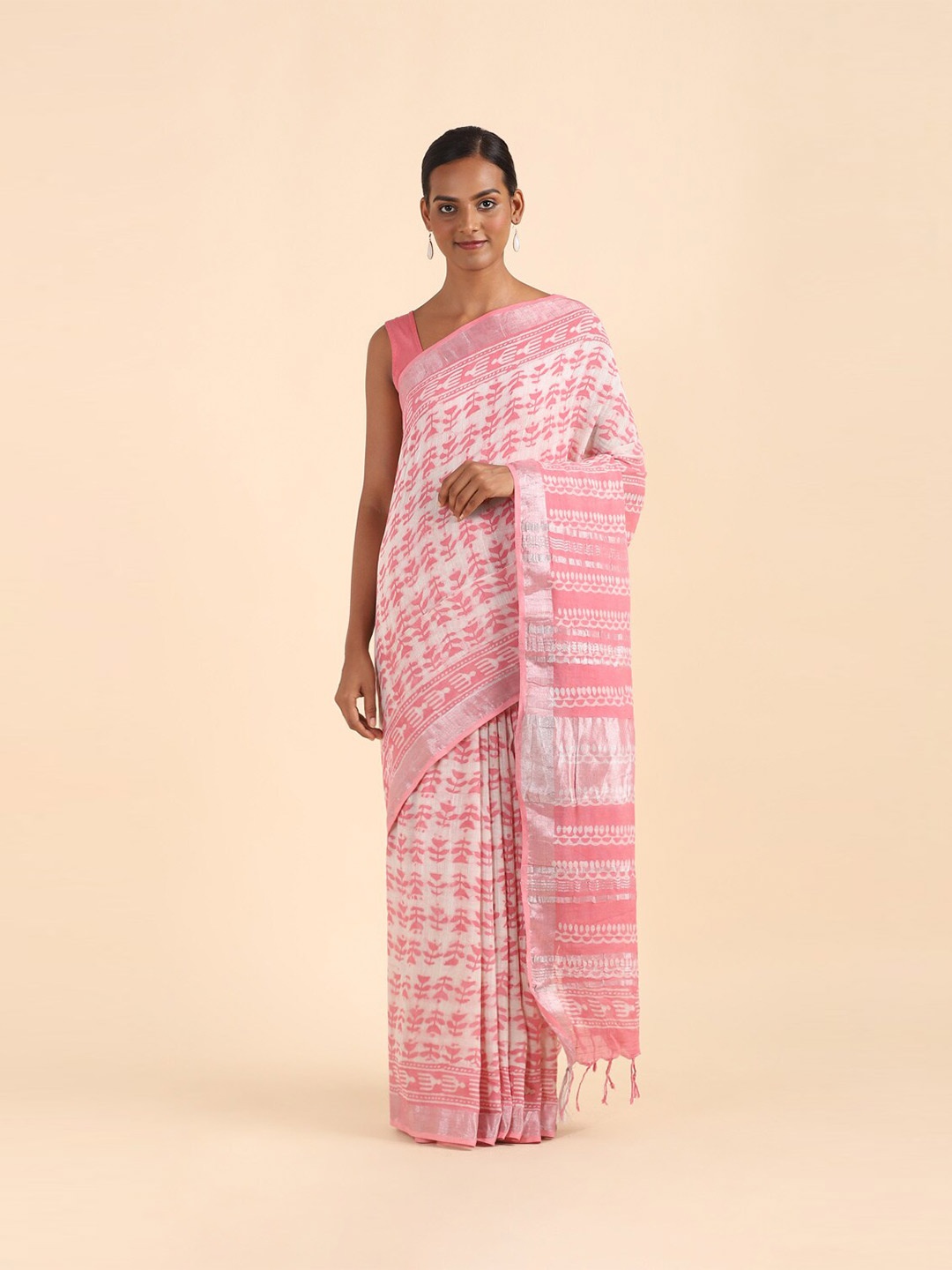 

Taneira Pink & White Floral Linen Blend Bagru Saree