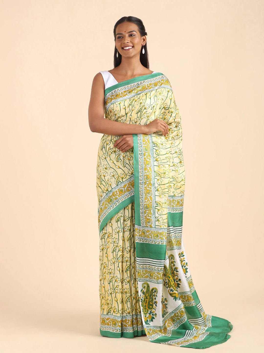

Taneira Yellow & Blue Floral Pure Silk Saree