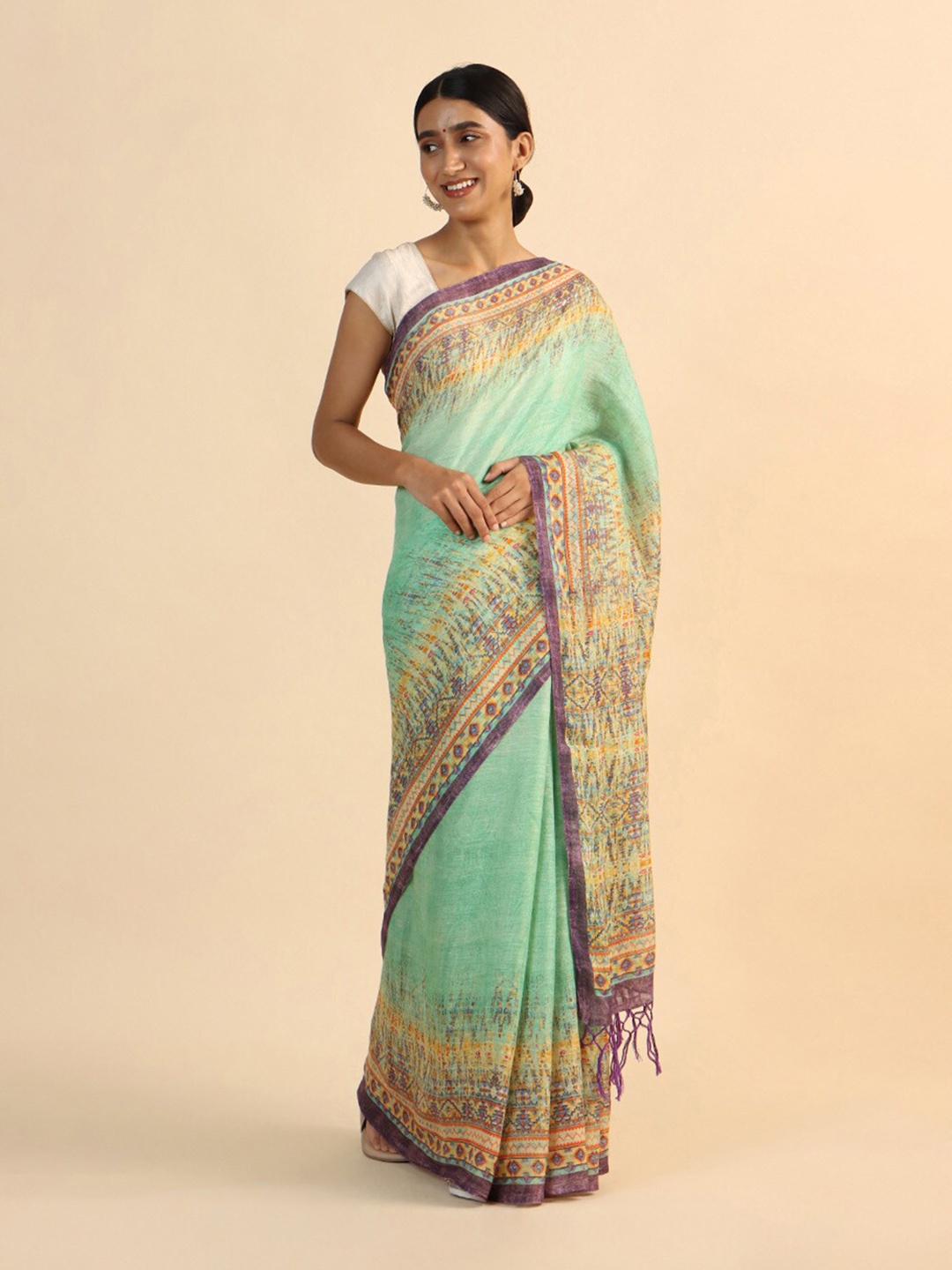 

Taneira Green & Purple Pure Linen Saree