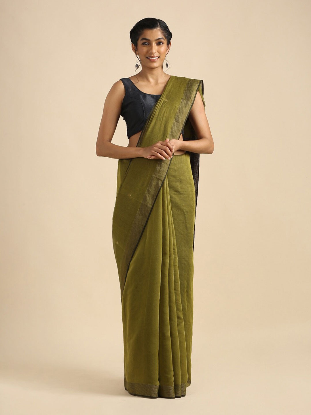 

Taneira Green Zari Silk Cotton Saree