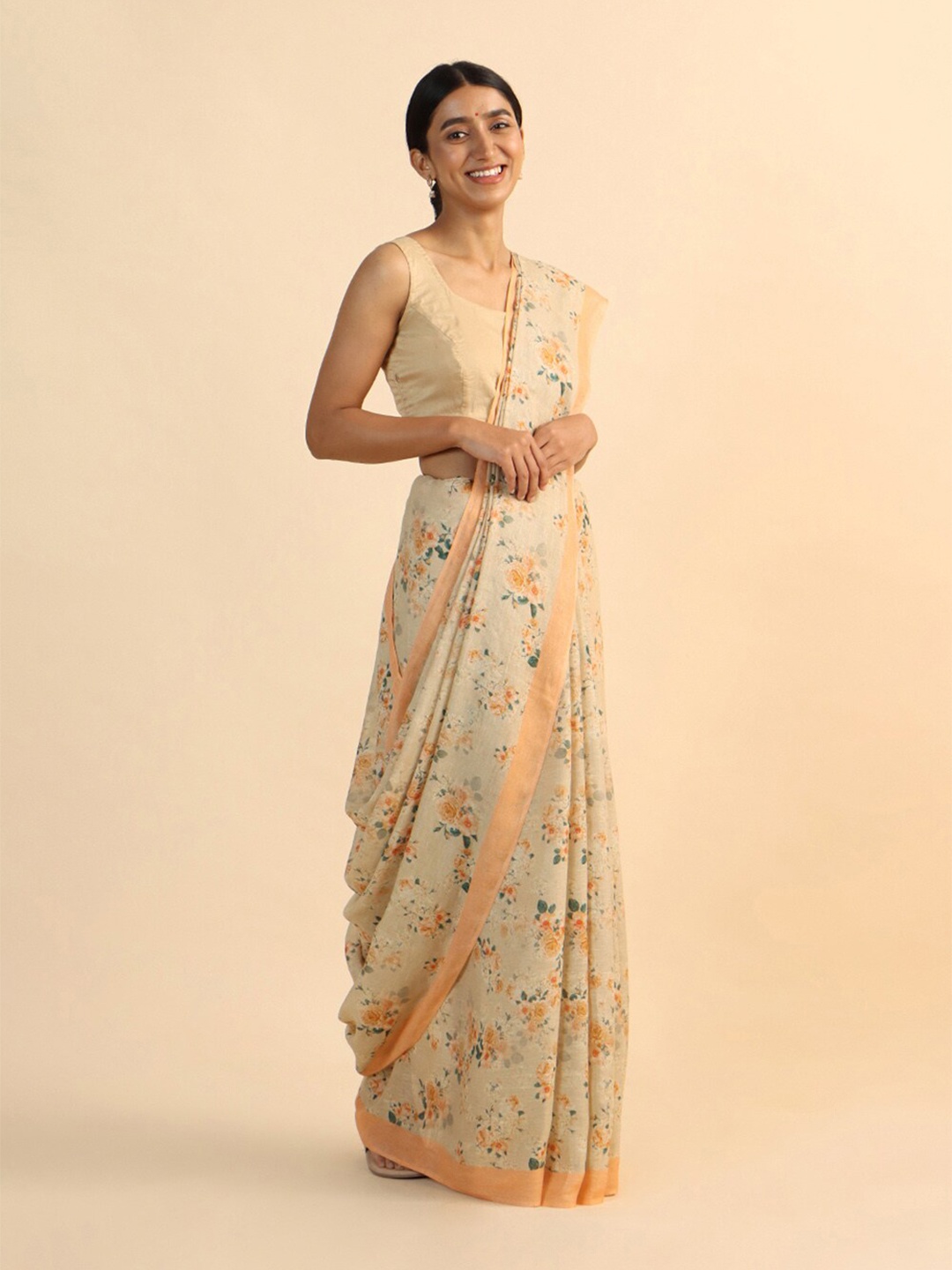 

Taneira Women Beige & Peach-Coloured Floral Pure Linen Saree