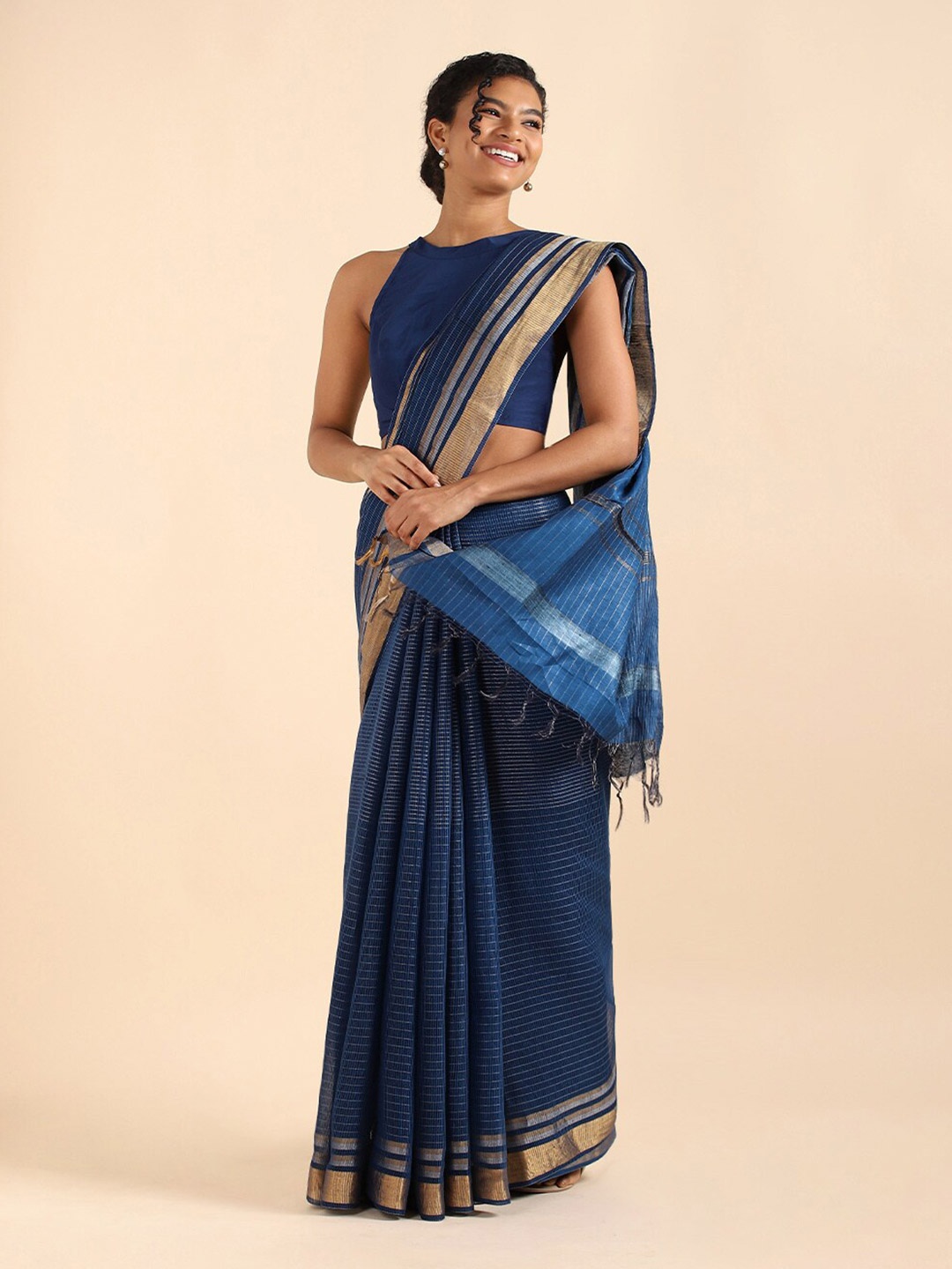 

Taneira Blue Striped Zari Pure Silk Saree