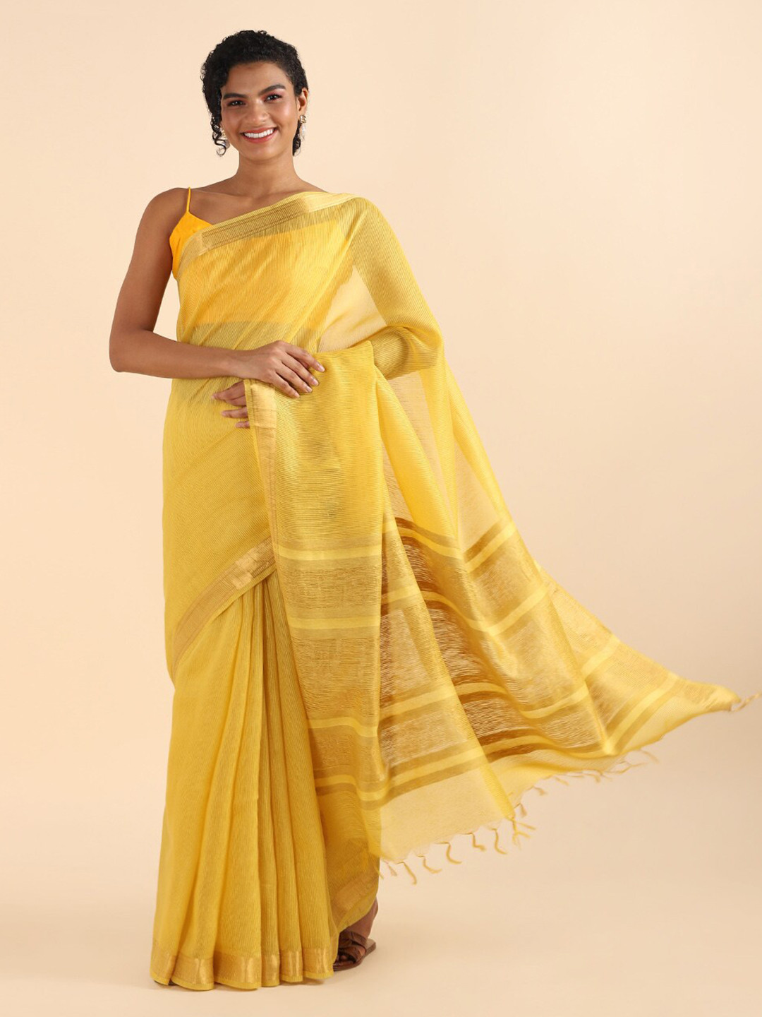 

Taneira Women Yellow & Gold-Toned Striped Zari Pure Silk Saree