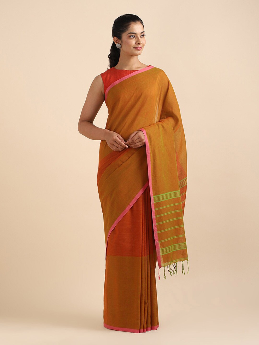 

Taneira Green & Pink Striped Pure Cotton Saree