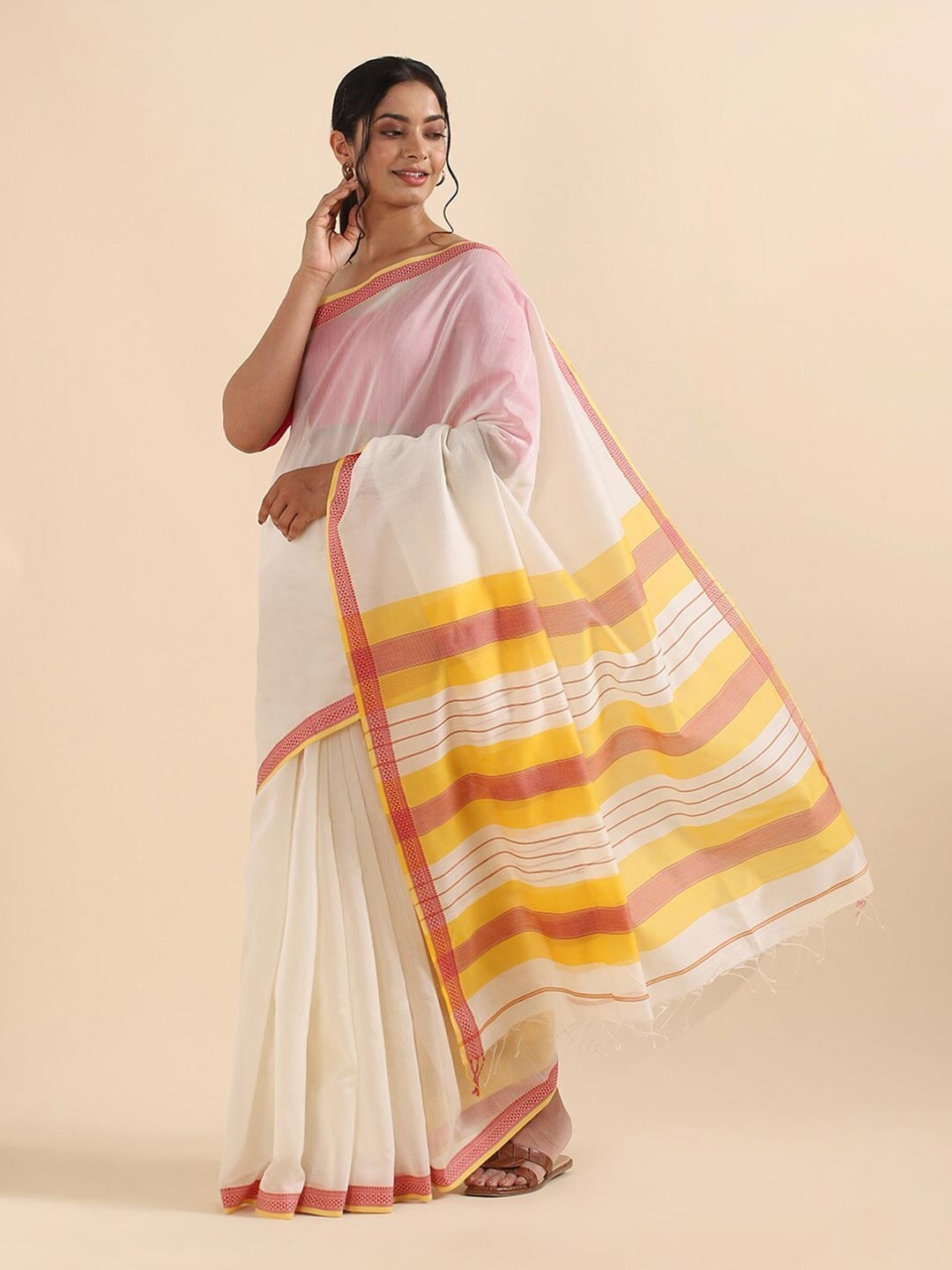 

Taneira White & Yellow Silk Cotton Maheshwari Saree