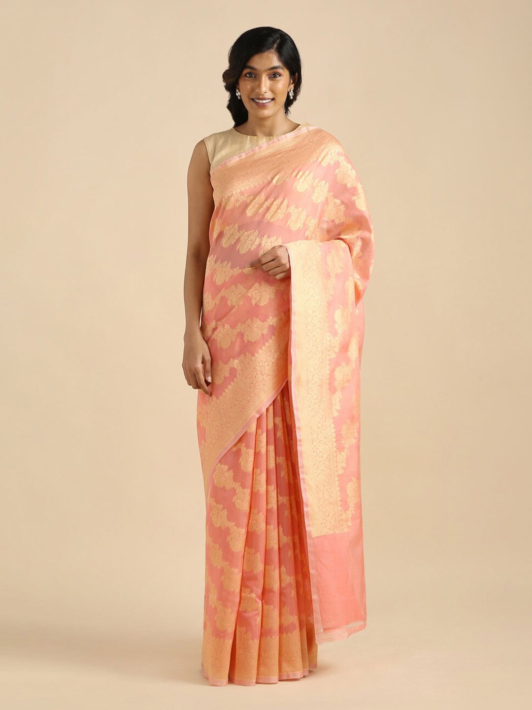 

Taneira Orange & Gold-Toned Ethnic Motifs Zari Silk Cotton Banarasi Saree