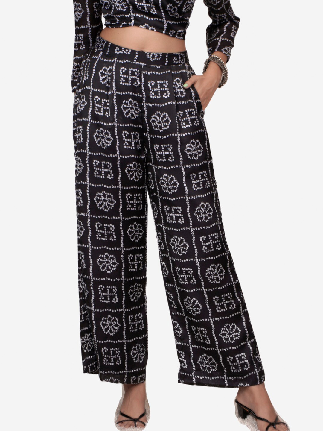 

Alaya By Stage3 Women Black & Off White Ethnic Motifs Printed Satin Palazzos