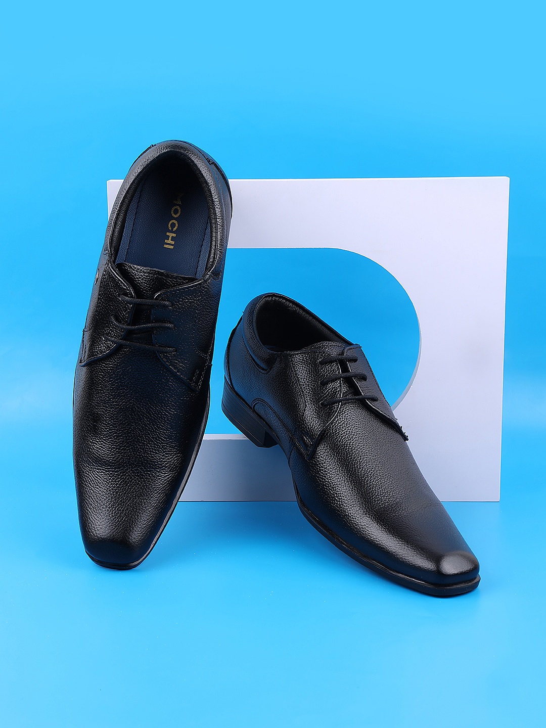 

Mochi Men Black Solid Leather Formal Derby